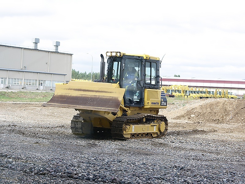 Komatsu D37EX/PX-22 бульдозері