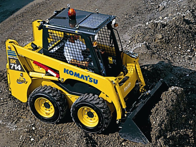 Komatsu SK714-5 борттық бұрылуы бар жүк тиегіші
